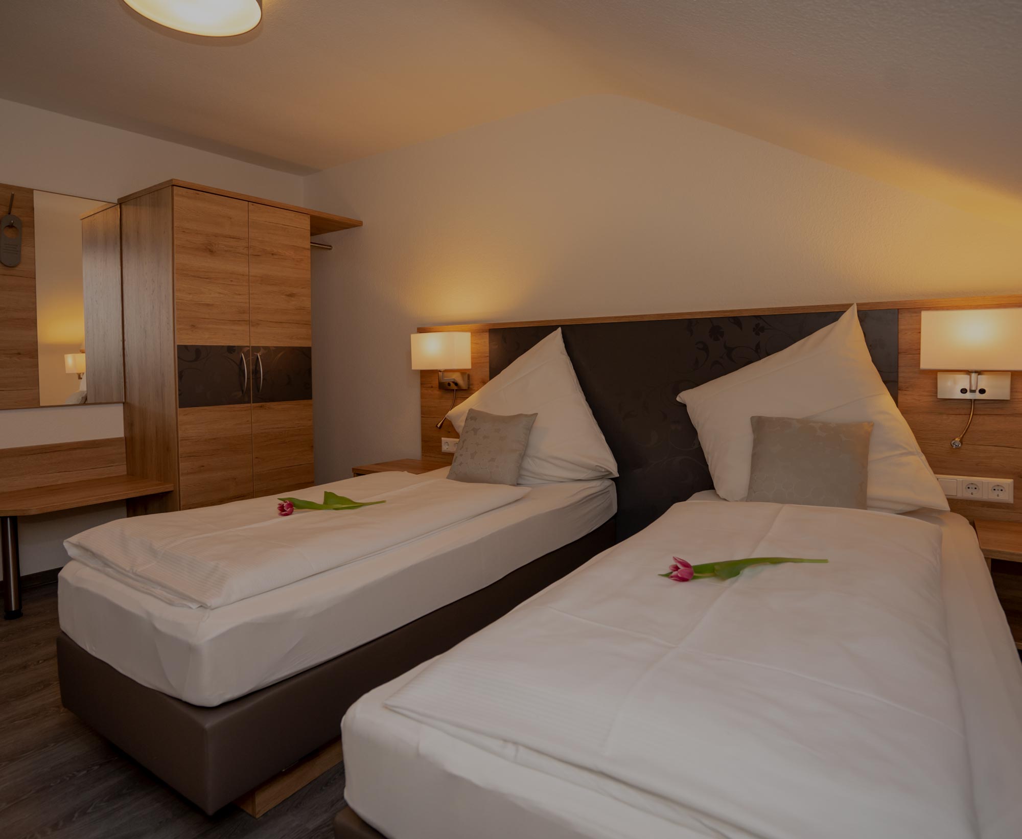 Friendly hotel room with double bed at Hotel Lamm